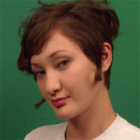 Young woman with short, reddish-brown hair